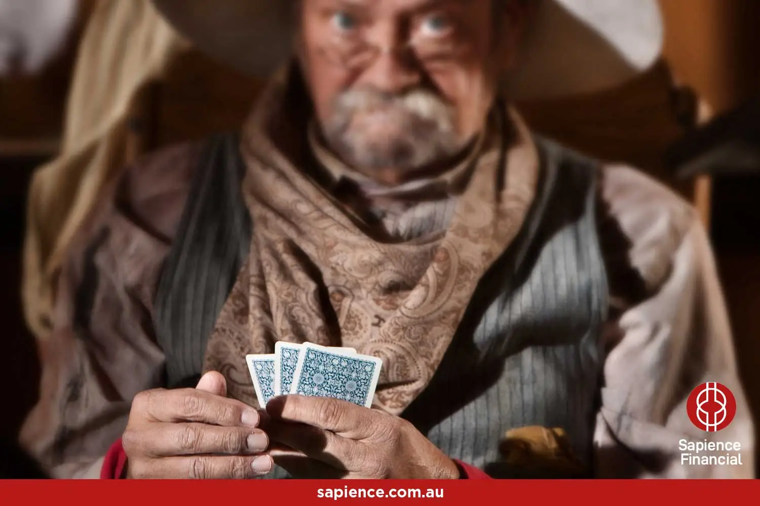 A time weathered looking cowboy playing poke in a wild west saloon