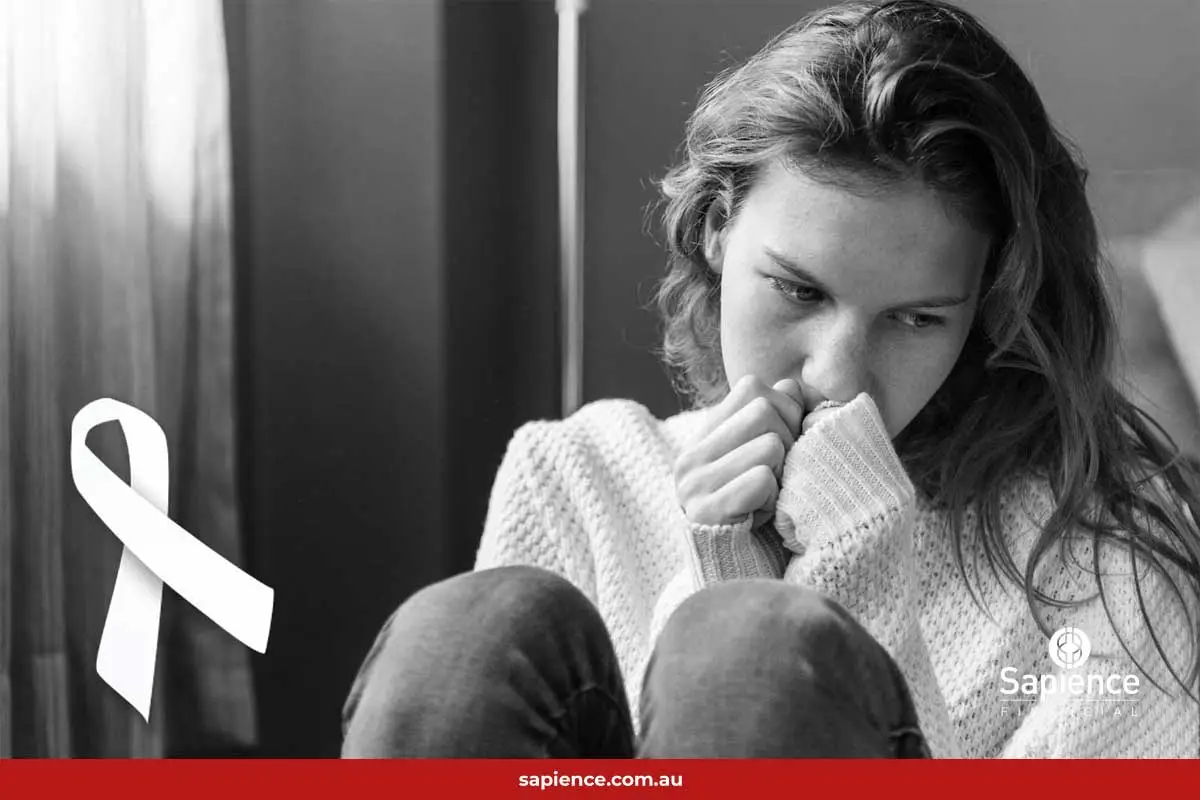 female sitting on floor