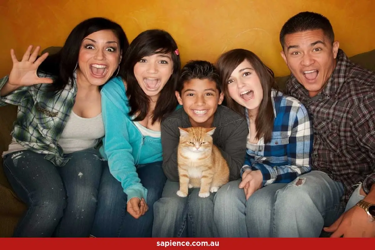 happy step family and their grumpy cat
