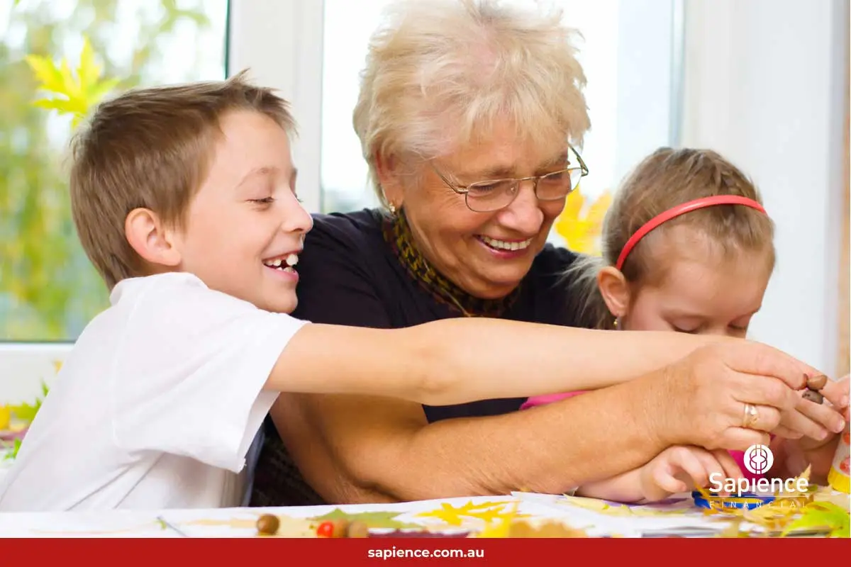 retiree and two grandchildren making crafts